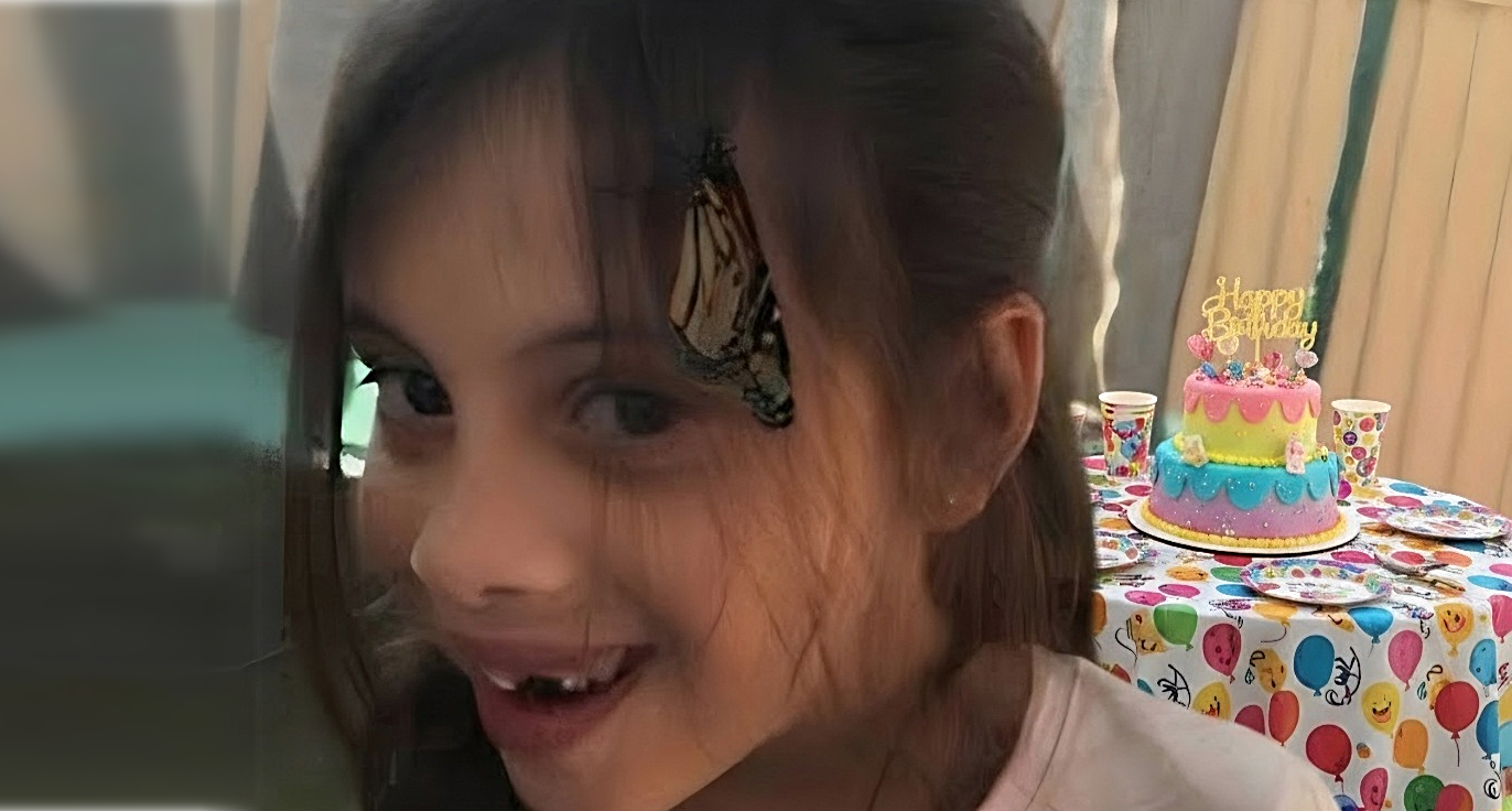Girl with a butterfly at her birthday party